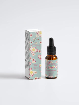 Flacon de face de l'huile nourrissante pour le visage "Douceur Vitale" de Rose et Jules, soin bio, vegan et naturel pour une peau hydratée et revitalisée.