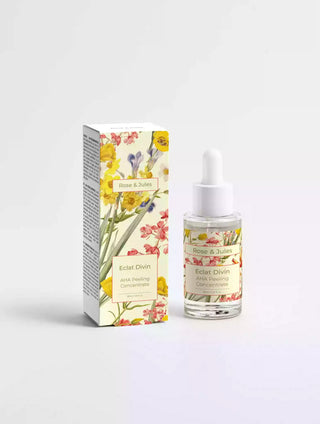 Flacon de face du concentré peeling "Éclat Divin" aux AHA de Rose et Jules, soin bio, vegan et naturel pour le visage, conçu pour exfolier et illuminer la peau.