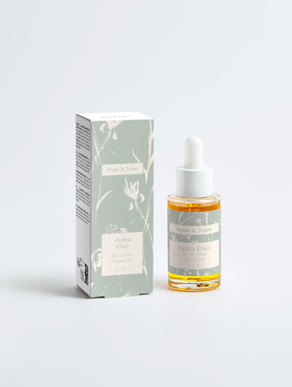 Image de face de l'huile visage Hydra Elixir de Rose & Jules, un soin tout-en-un bio, vegan et naturel, formulé pour nourrir et revitaliser intensément la peau.